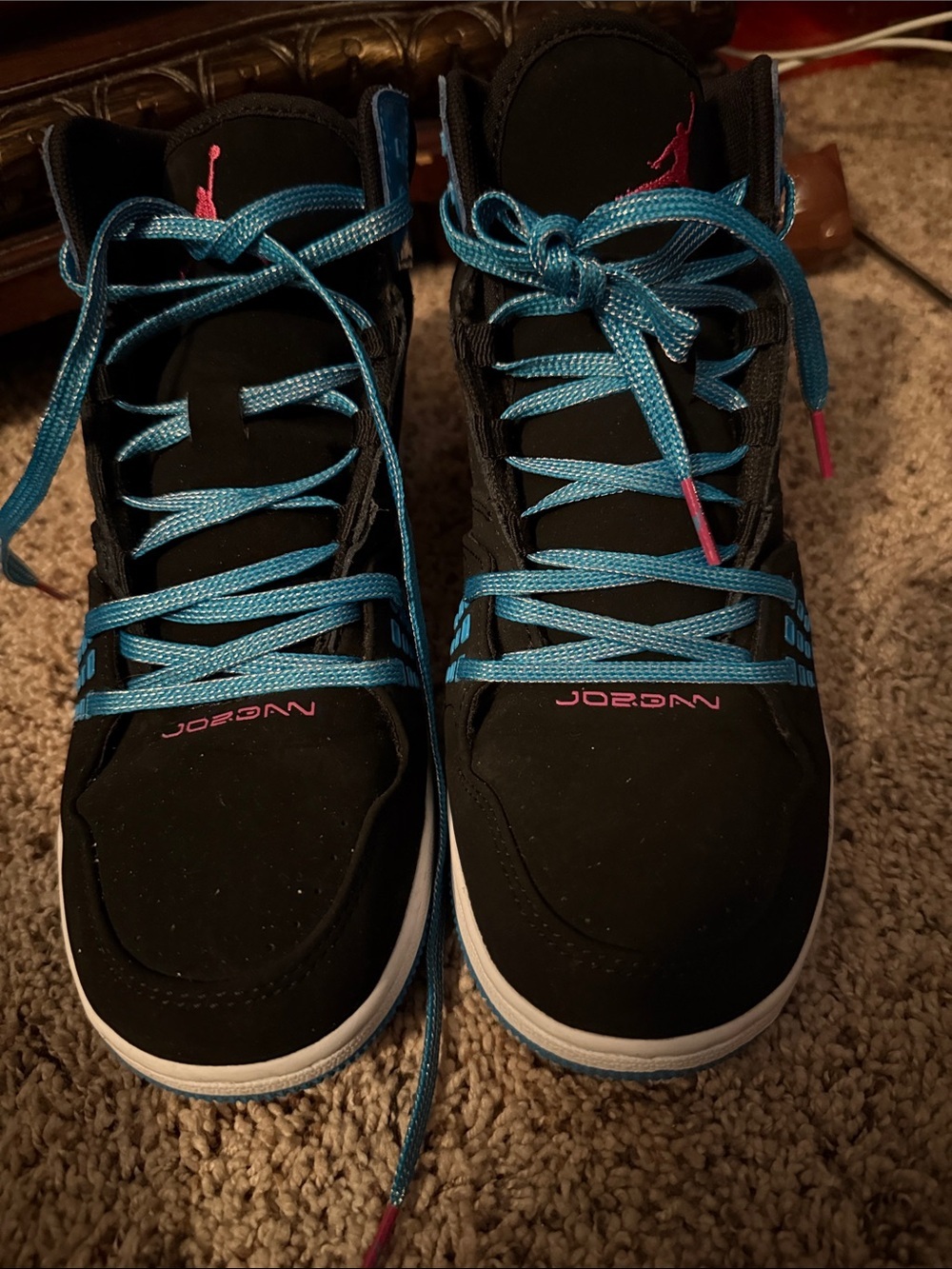 Jordan Black High-Top Sneakers with Teal Laces and Pink Accents